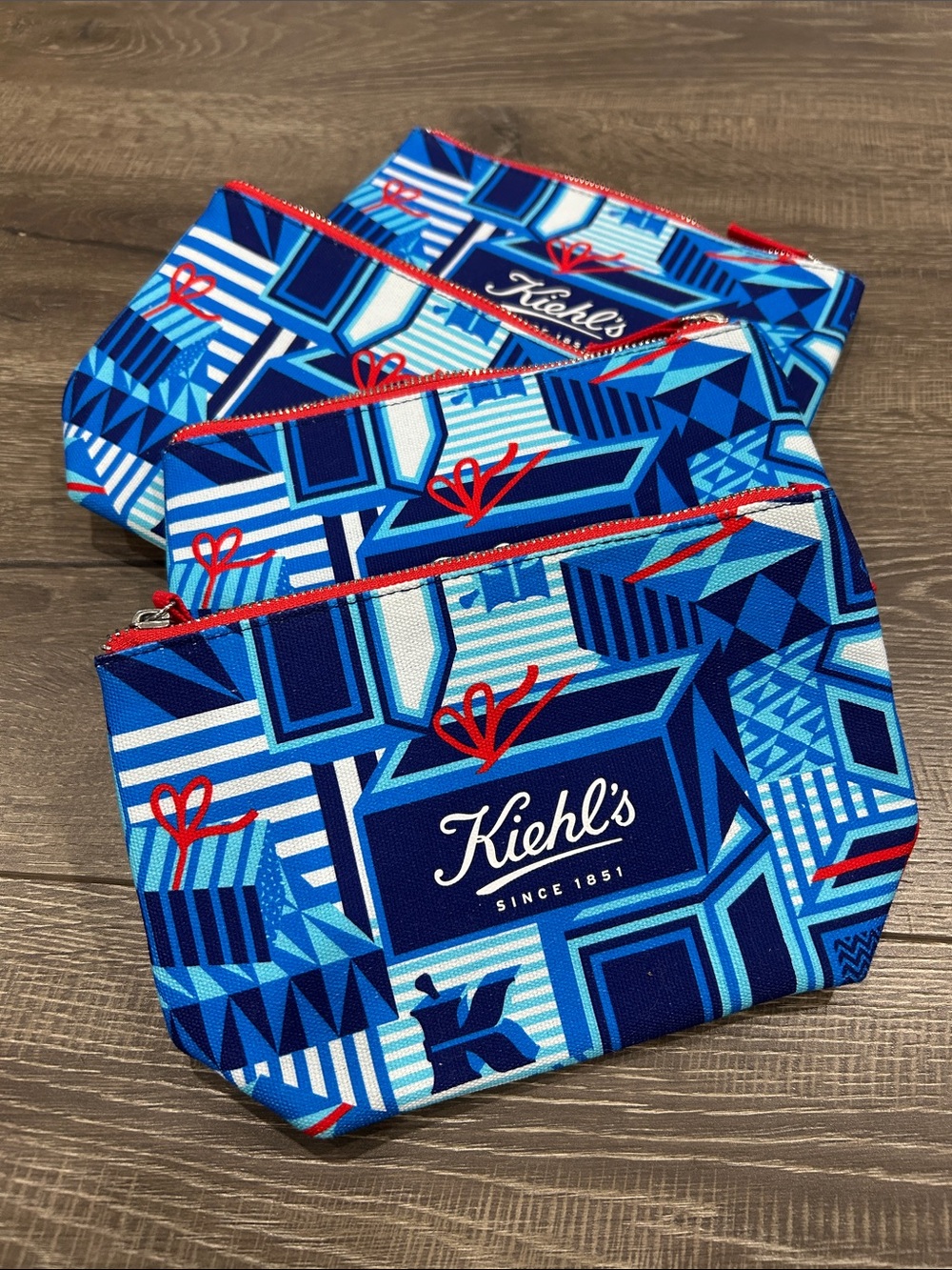 4/$20 Kiehl’s cosmetic pouches